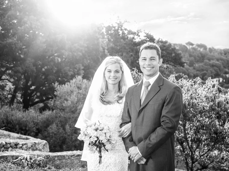 Newlyweds in a sunlit garden