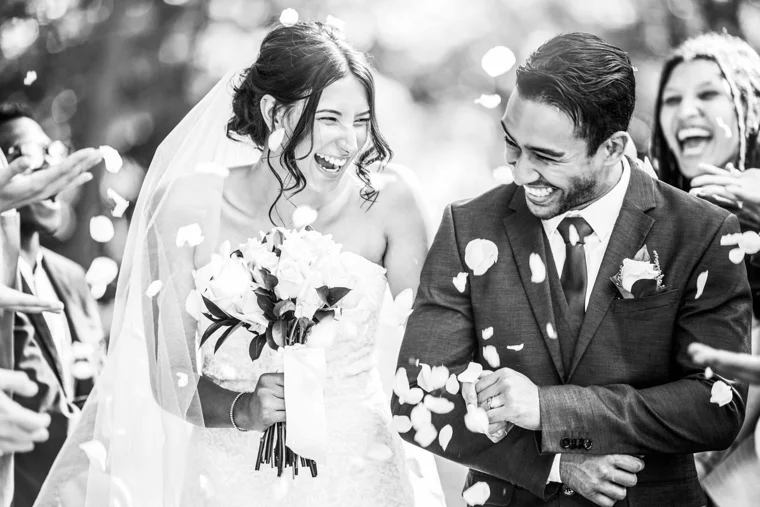 Newlyweds beneath a shower of confetti