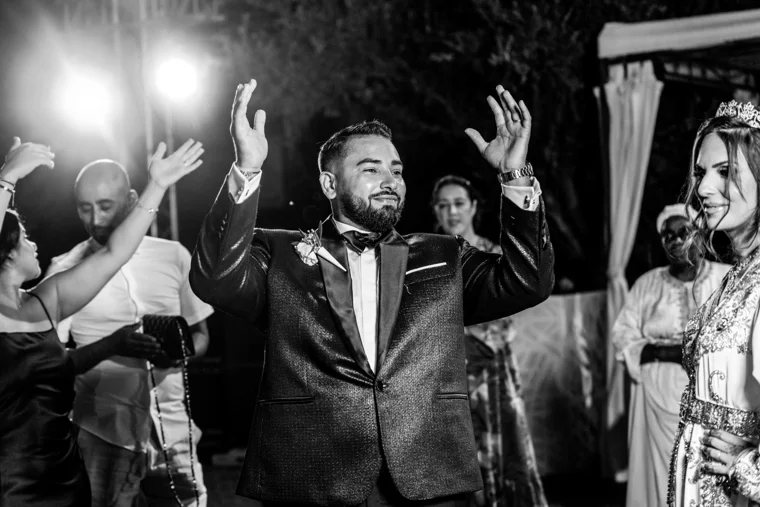 Groom celebrating on the dance floor