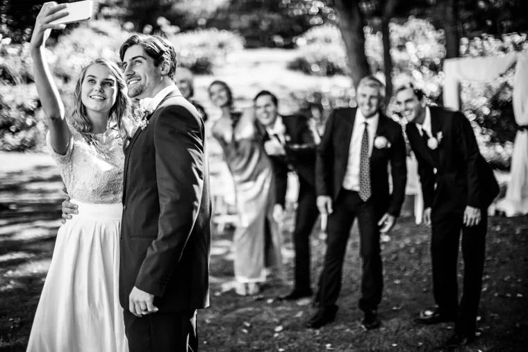 Wedding guests enjoying a garden celebration
